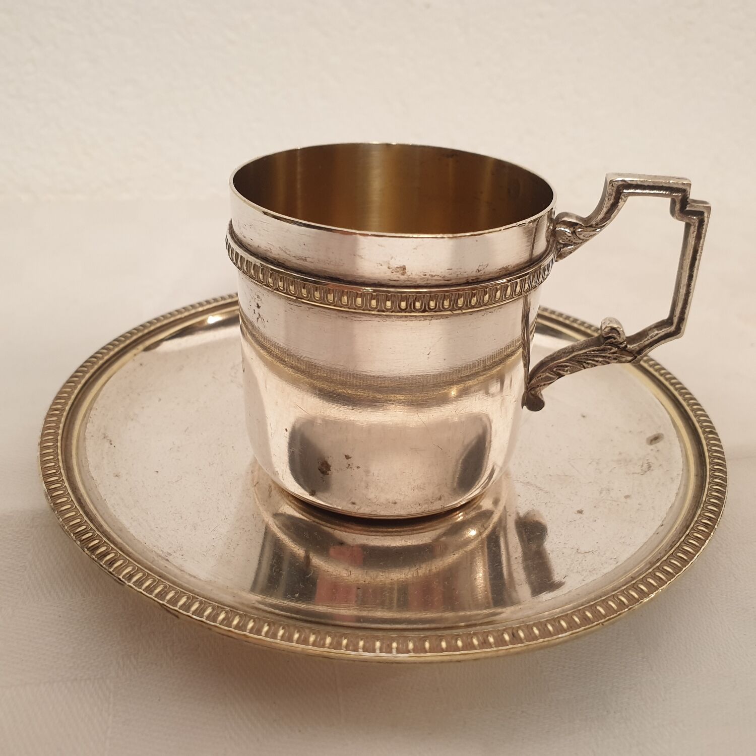 2 silver metal cups