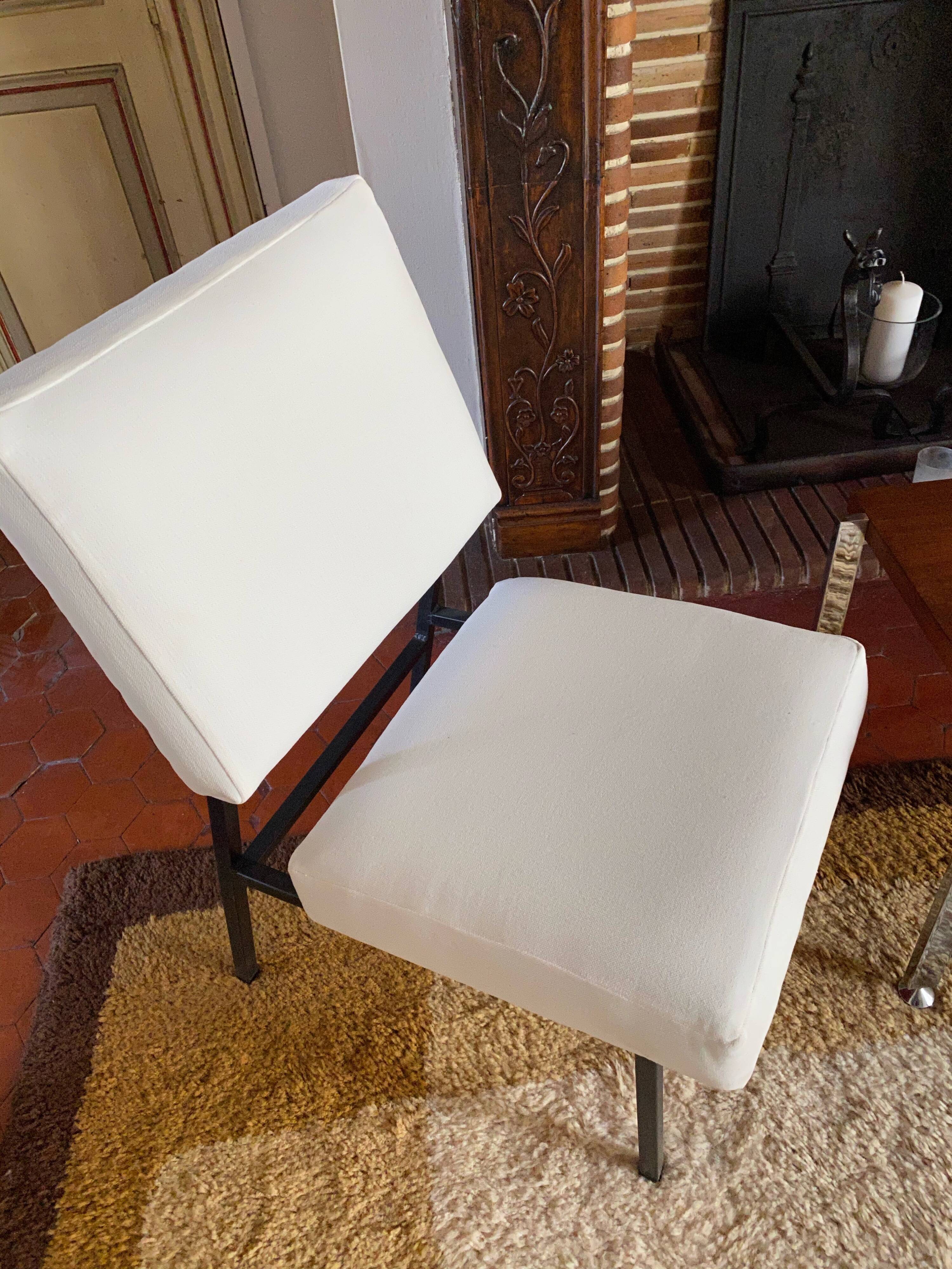 Pair of Paul Geoffroy designer armchairs published by Airborne