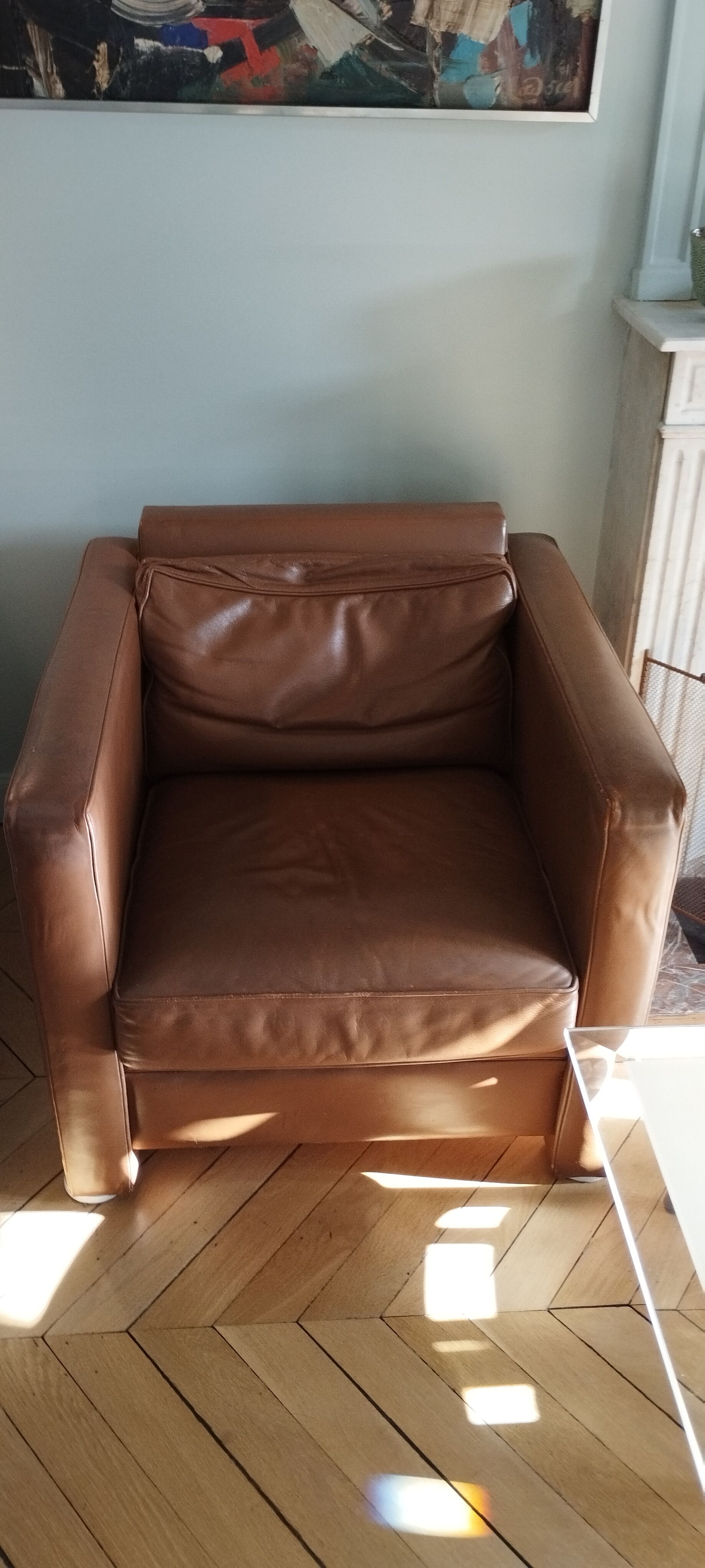 Hugues Chevalier leather armchairs