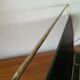 Vintage metal magazine rack in gold and black vinyl Newspaper holder
