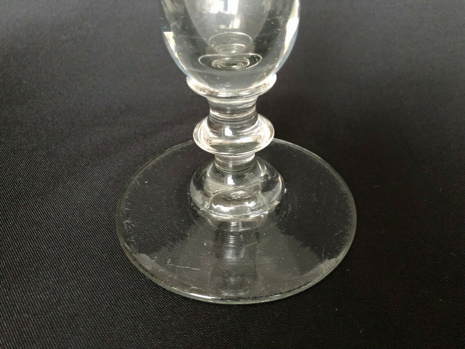 Glass oil lamp blows on foot shower