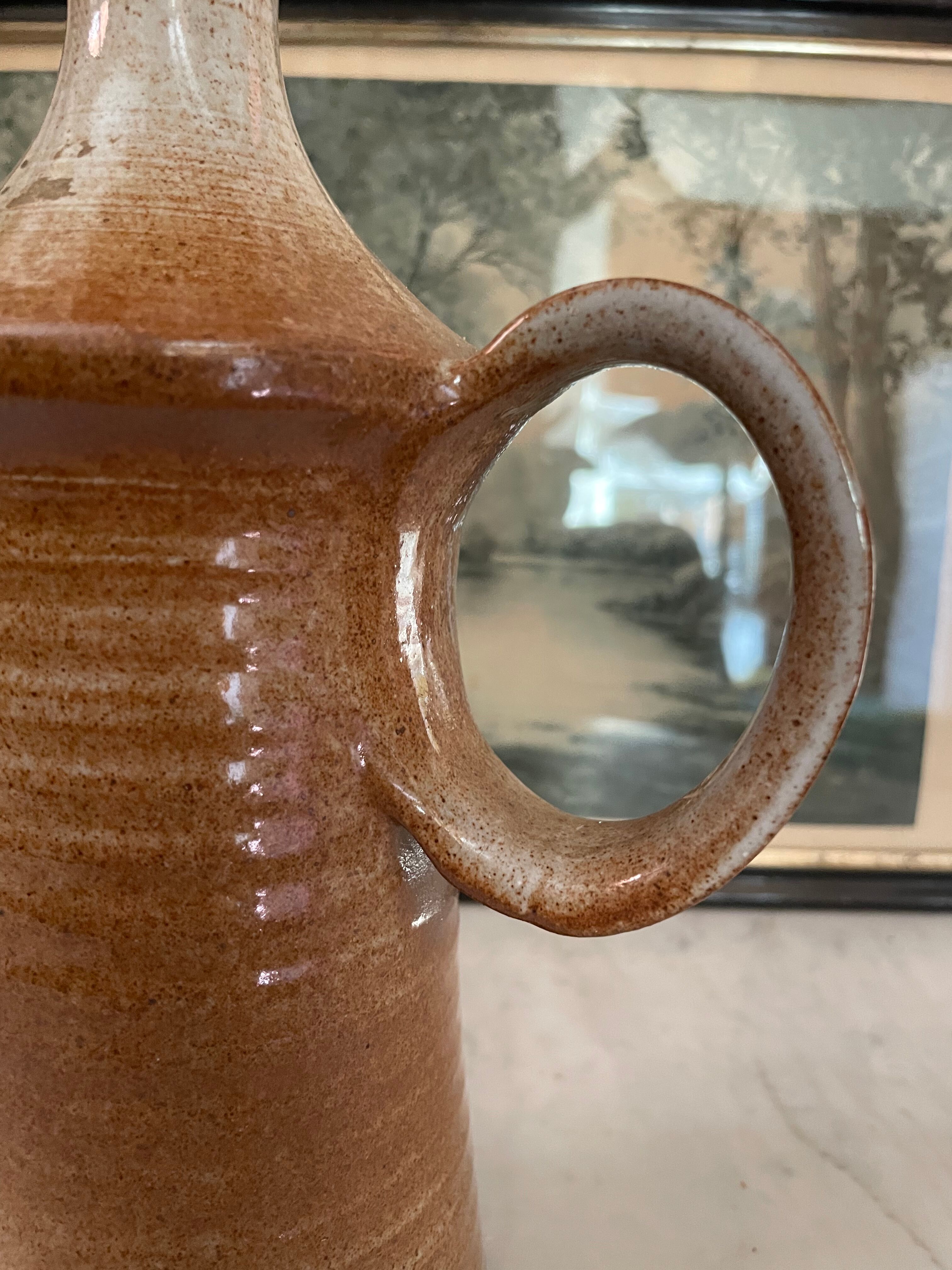 Signed sandstone decanter