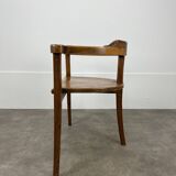 Chalet-style carved wooden tripod armchair