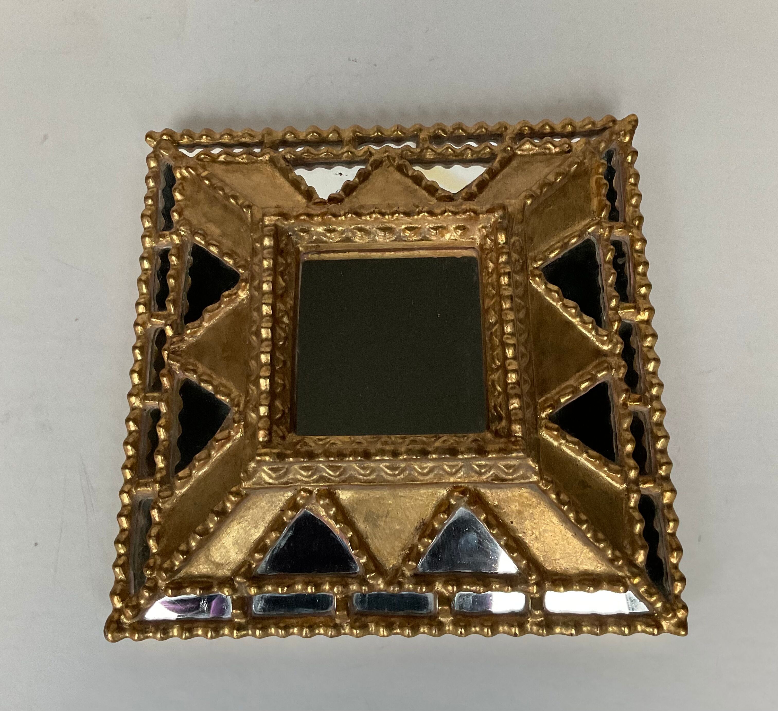 Mirror with parclose ien gilded wood