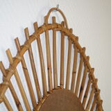 Free-form sun mirror in 60s rattan