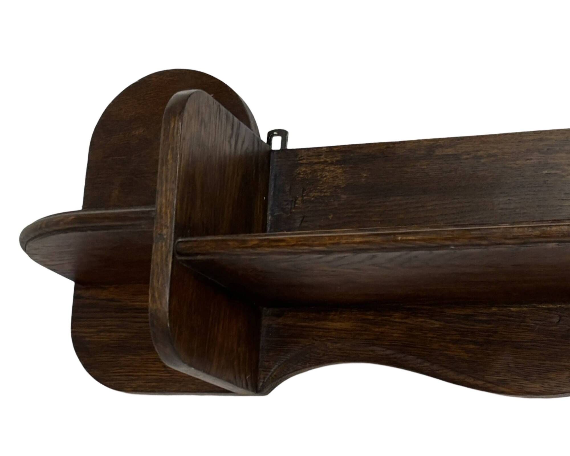 Vintage wooden wall shelve rack bookshelf in dark oak wood minimalist