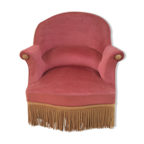 Toad in powder pink velvet armchair