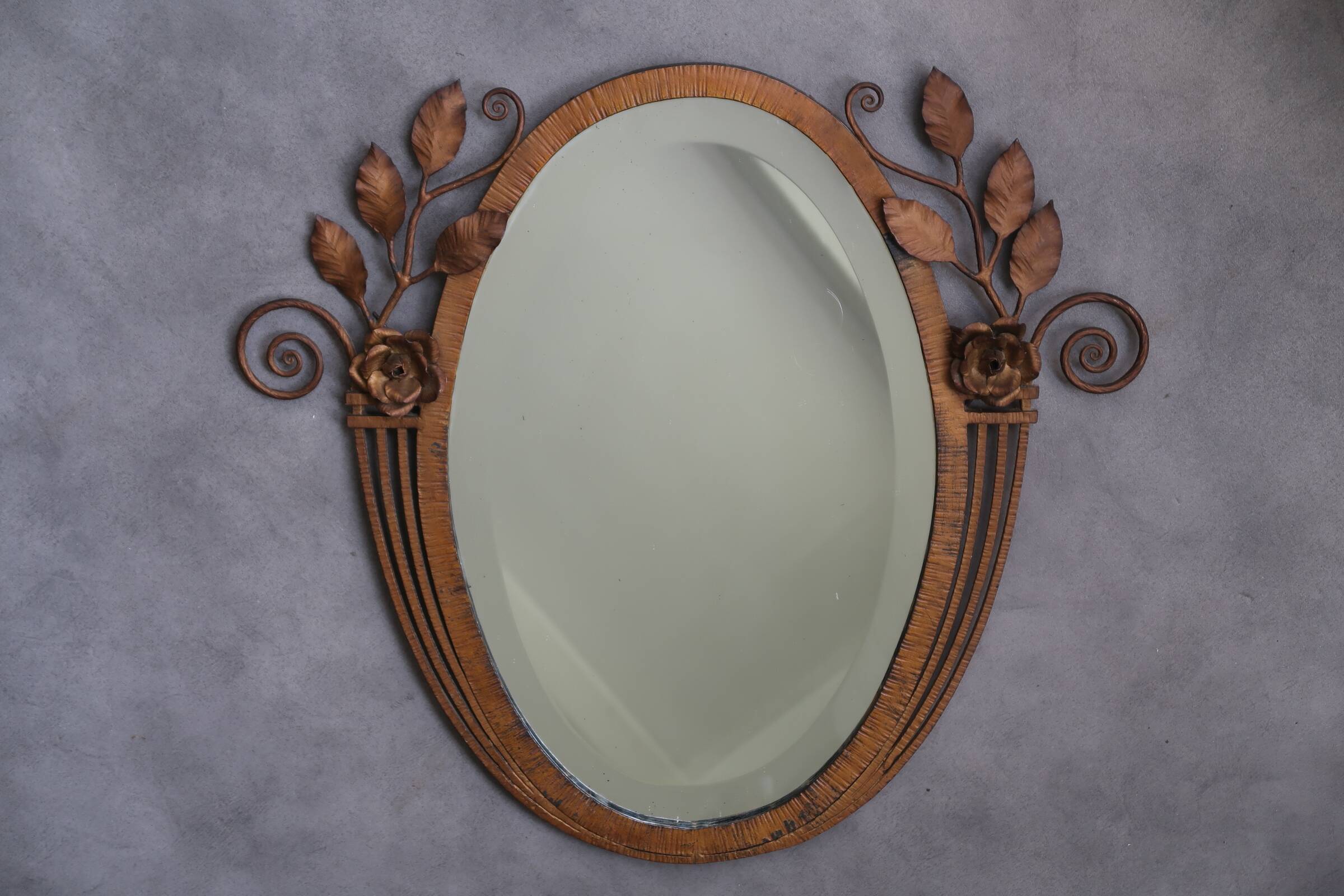 Art Deco mirror from the 1930s in hammered steel.