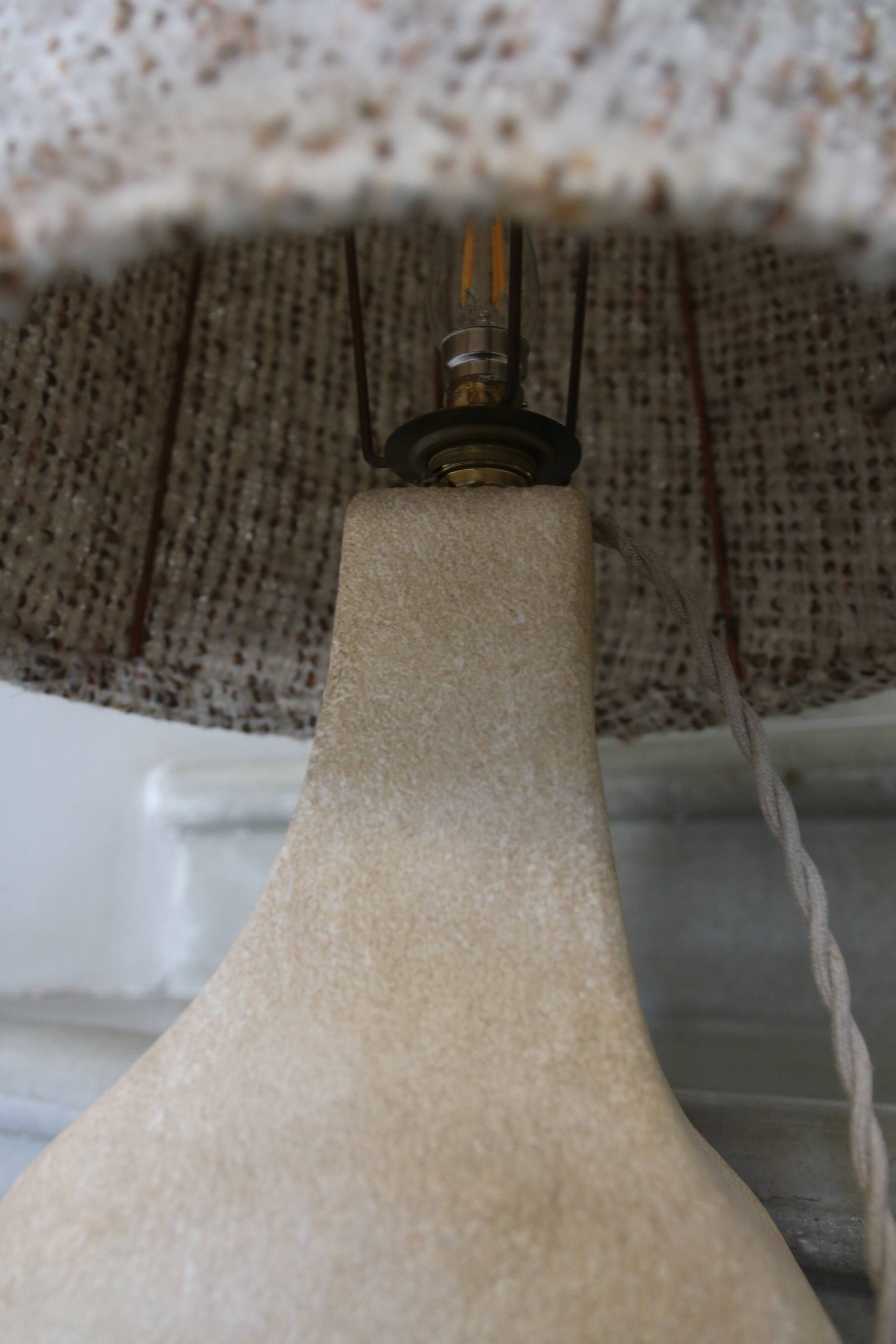 Large sculpted stone lamp, in the style of Albert Tormos, 1970s.