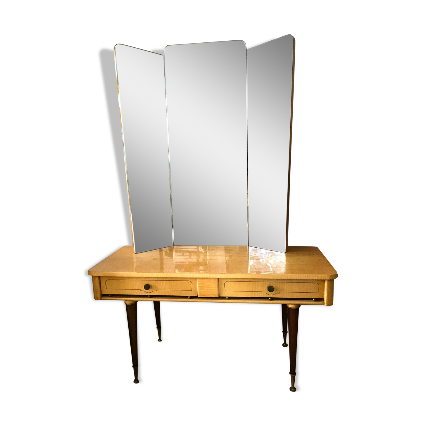 Dressing table in a vintage mirror triptych