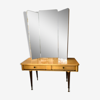 Dressing table in a vintage mirror triptych