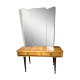Dressing table in a vintage mirror triptych