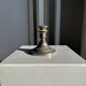 Small antique candle holder engraved in silver-plated metal, in its original condition.
