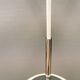 White hanging lamp with metal suspension, made with ball round opal glass shade.