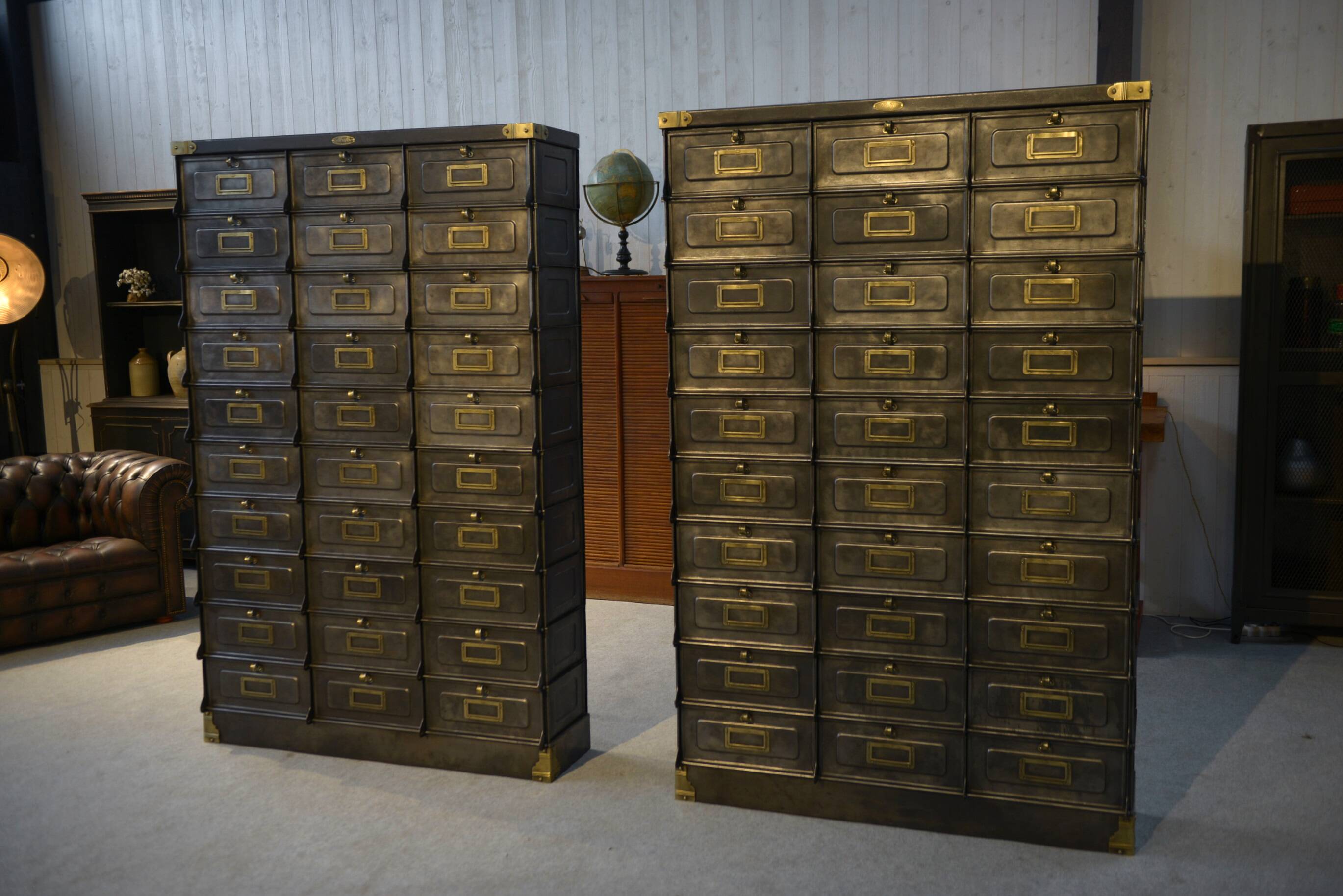 Pair of STRAFOR French cabinets with flaps, circa 1920s