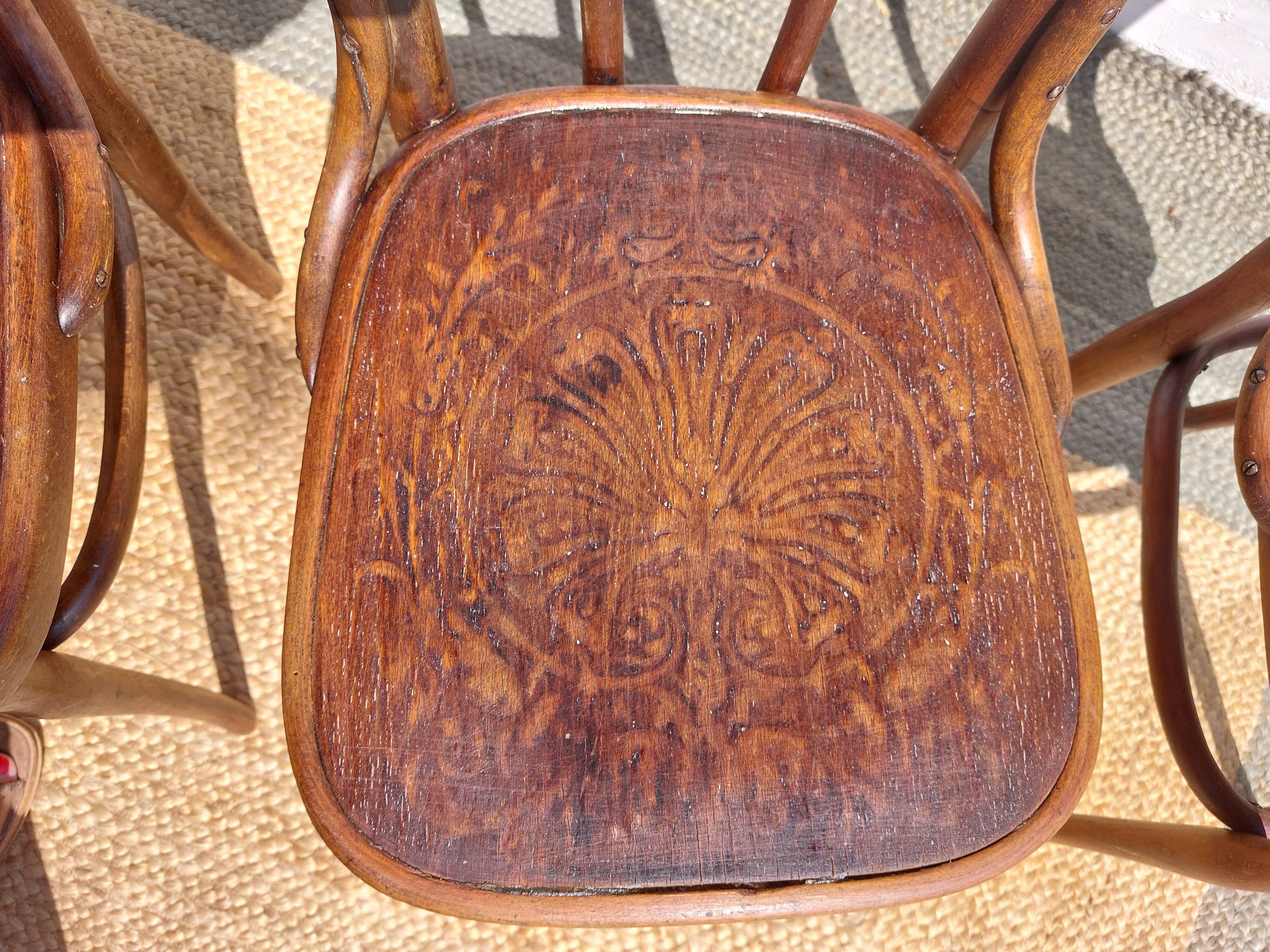 set of 3 curved wooden bistro chairs with patterns