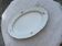 Large yellow porcelain serving dish by Bernadotte from the 1960s, with a gold rim and relief.