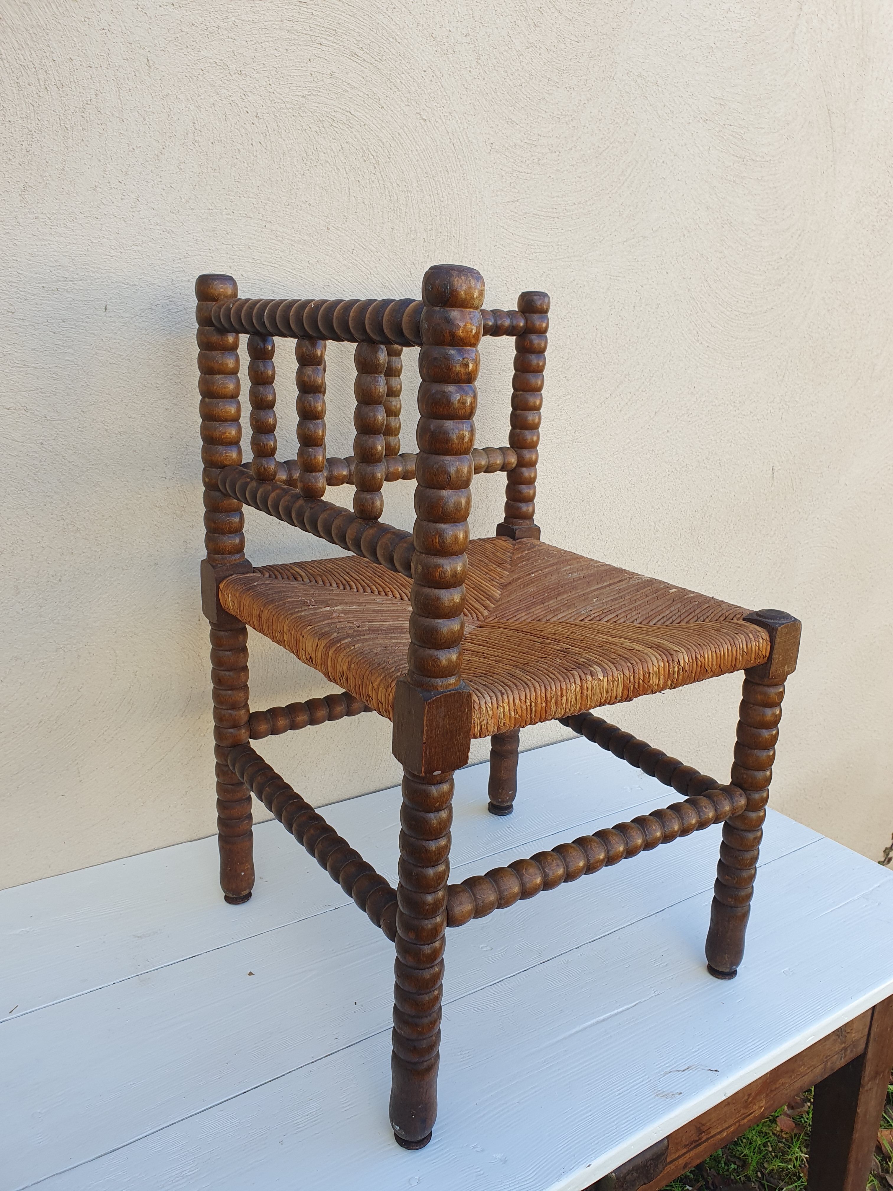 Corner armchair turned rosary style
