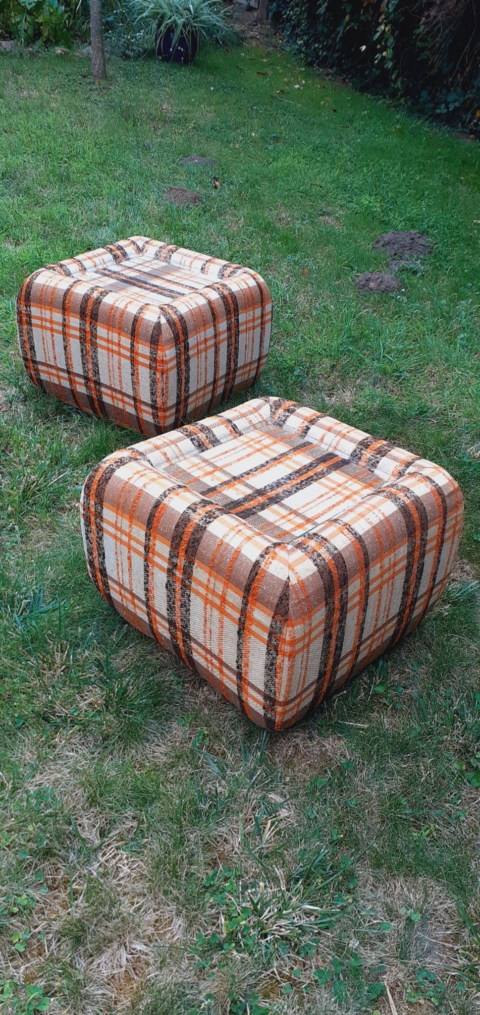 Pair of vintage 70s fabric coffee tables with glass tops