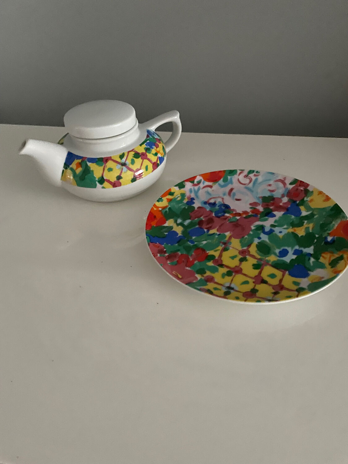 Teapot and its plate