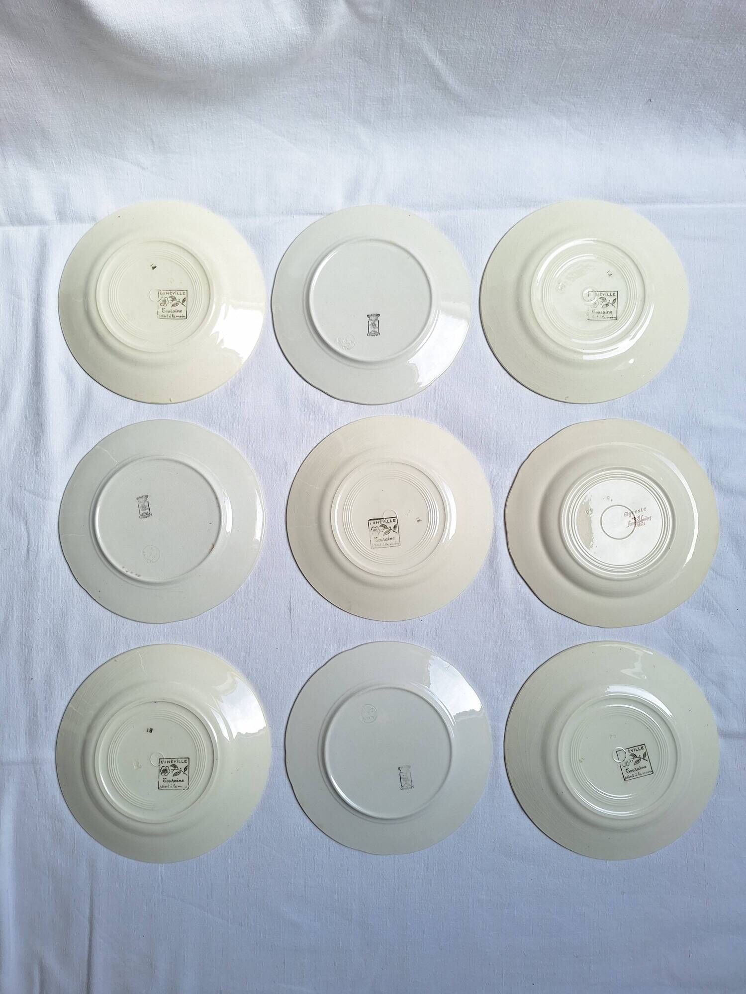 Vintage flower dessert plates from Sarreguemines, Longwy, and Lunéville.