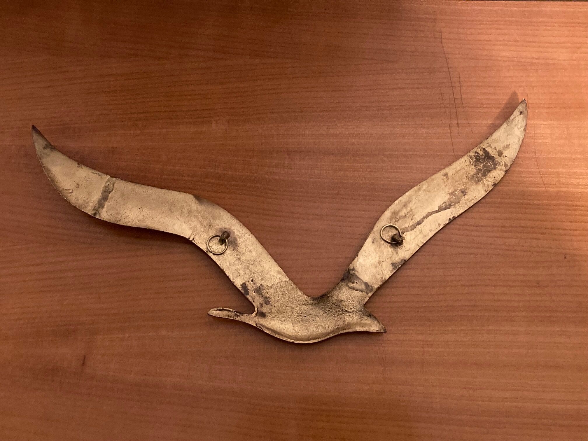 Set of two brass birds to hang