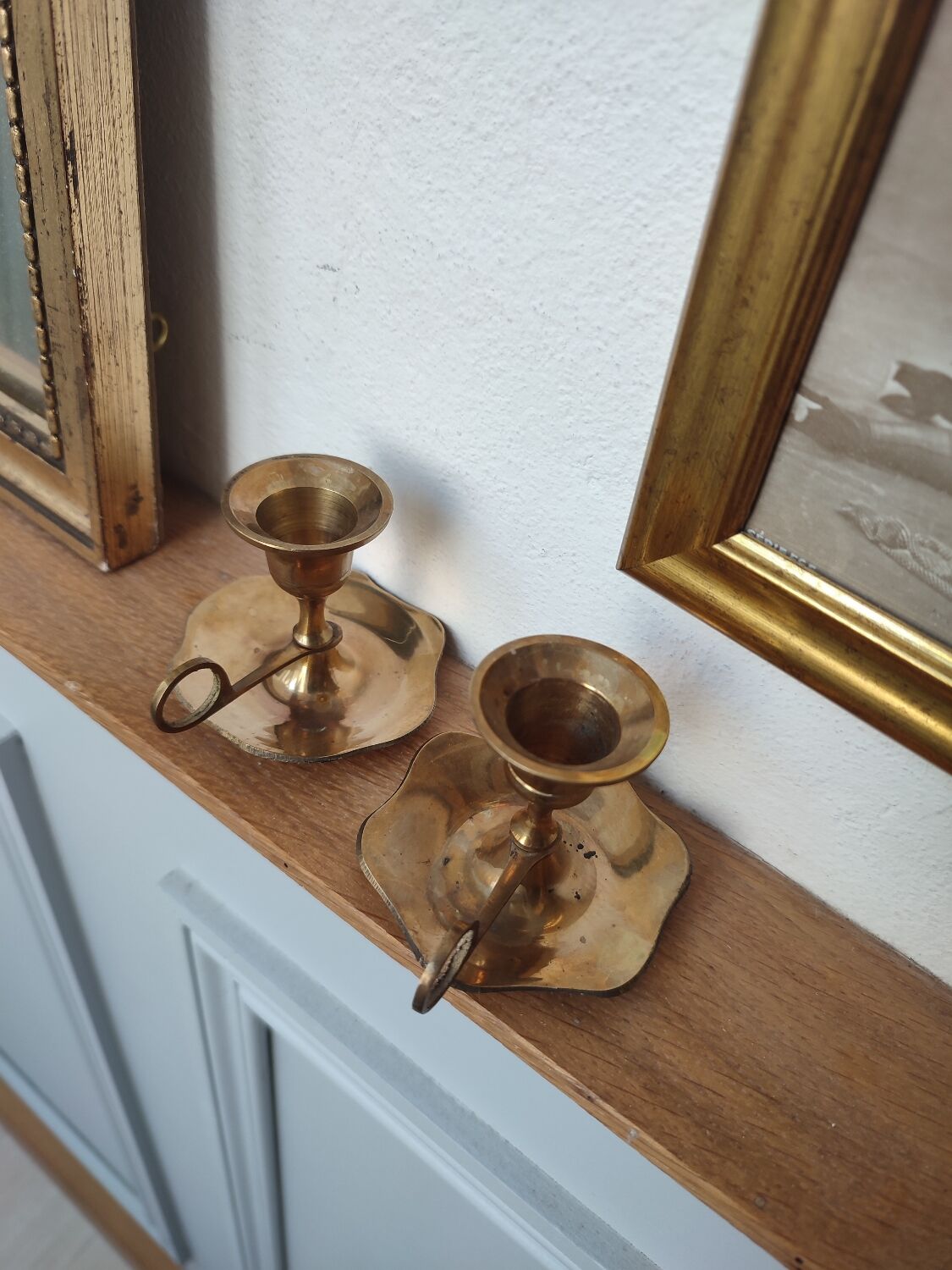Brass hand candle holder