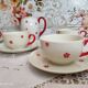 Service à café ou à thé 11 pièces en porcelaine Bavaria beige et petites fleurs oranges