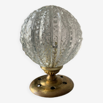 Old brass table lamp and bubble globe