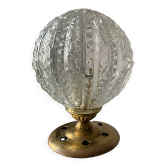 Old brass table lamp and bubble globe