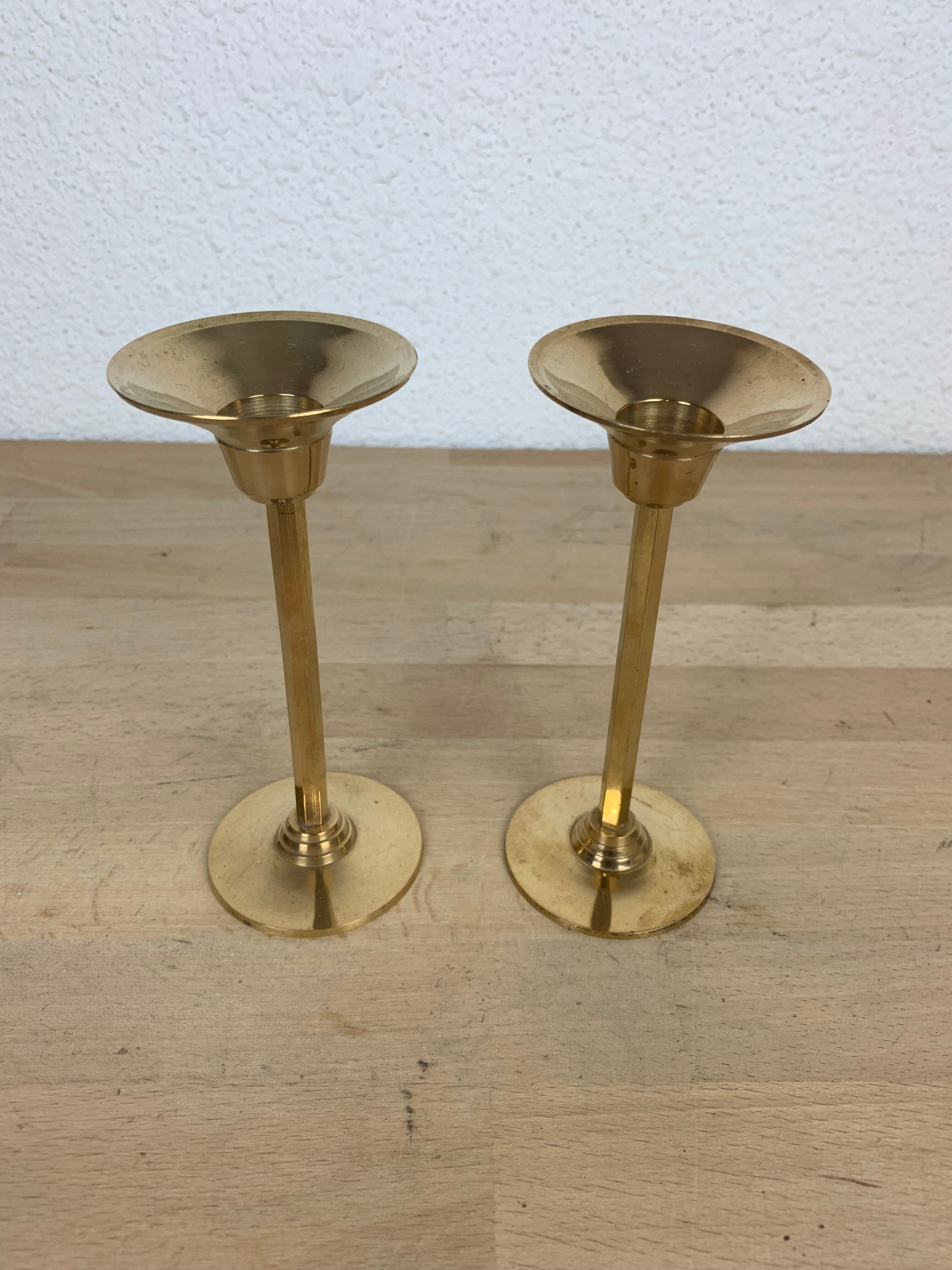 Pair of vintage golden brass candle holders