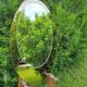 Oval Italian mirror of the 70s two complexions