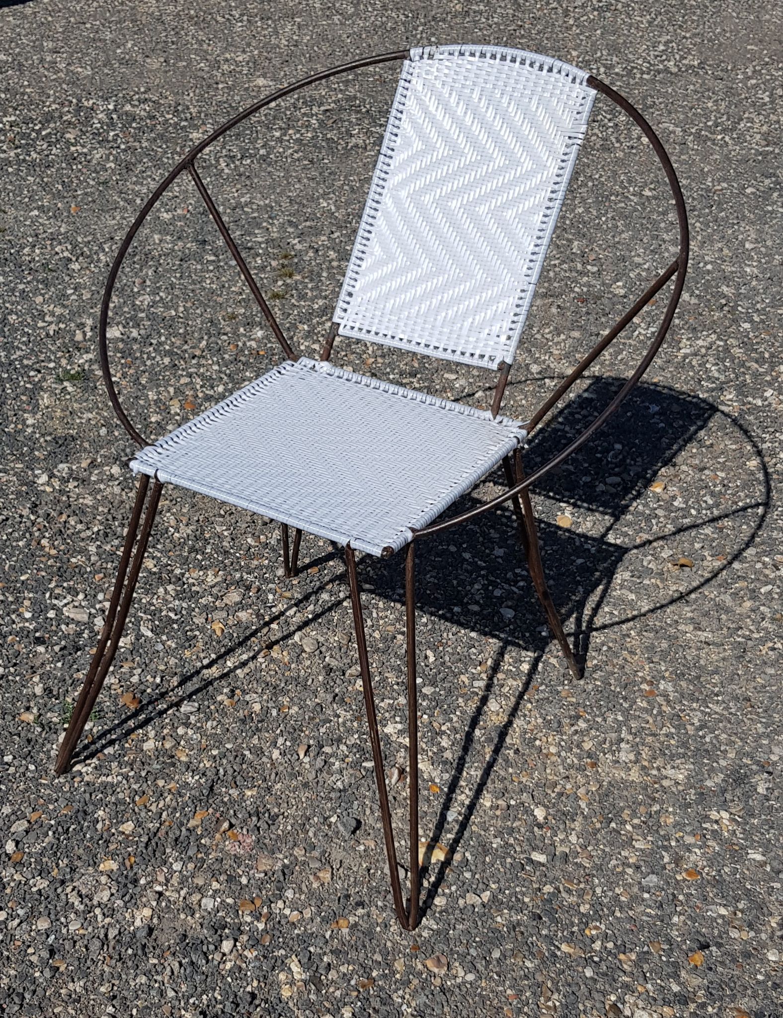 Vintage black metal armchair