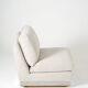 Beige fireside chair by Jacques Charpentier