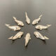 8 whale-shaped knife holders in silver metal