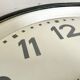 Black swiss industrial wall clock from inducta, 1960s