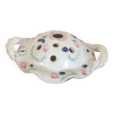 Pretty vase with holes in white porcelain flowers with small flowers and twisted handles