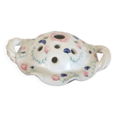 Pretty vase with holes in white porcelain flowers with small flowers and twisted handles