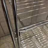 Modular wall bookshelf desk in vintage chrome.