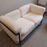 A sofa and two LC2 Cassina armchairs