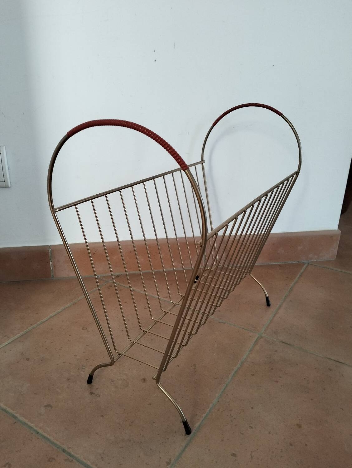 Golden magazine rack