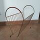 Golden magazine rack