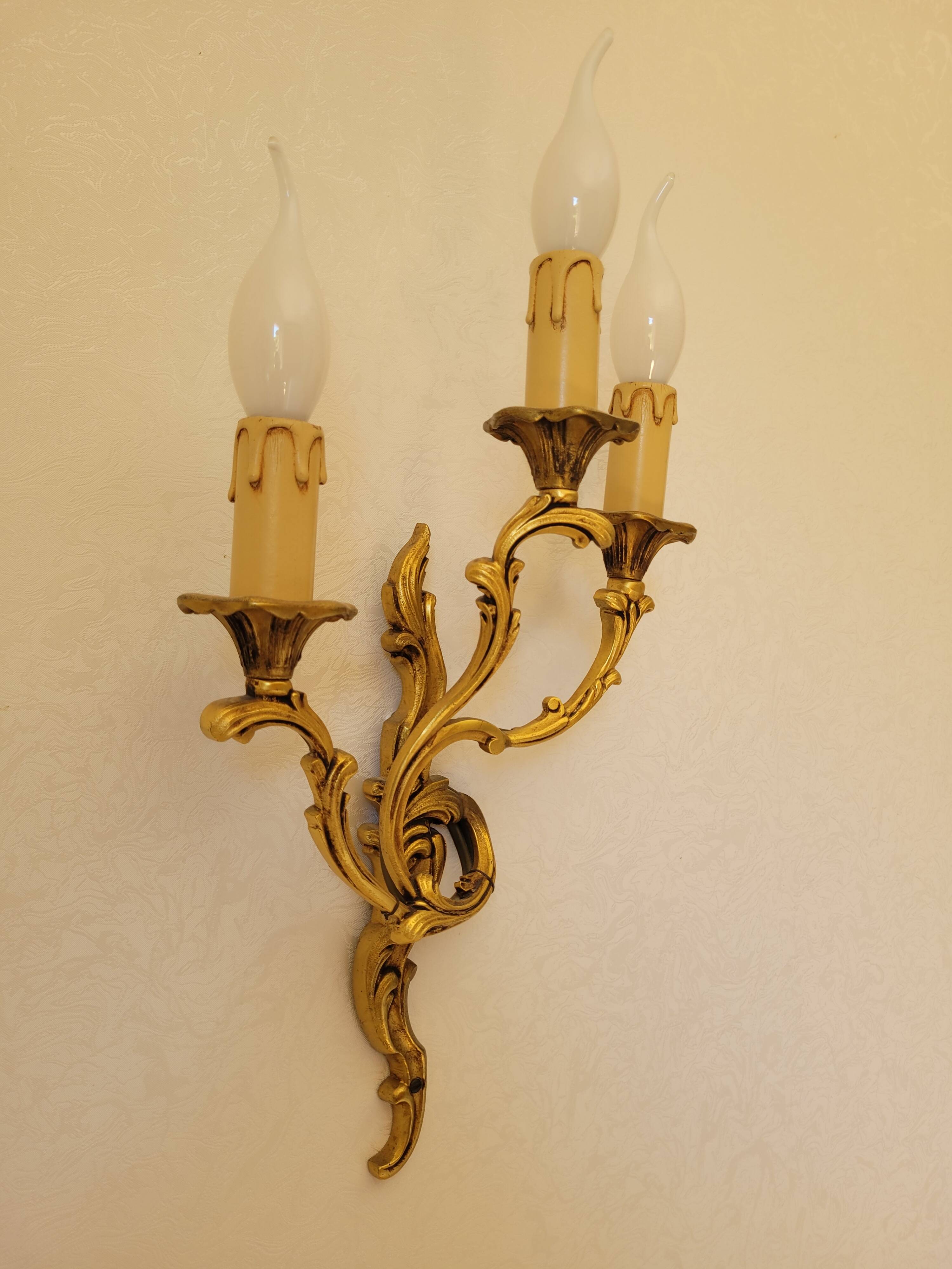 2 gilded bronze wall lights