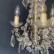 Small antique chandelier with tassels and bronze from the early 20th century