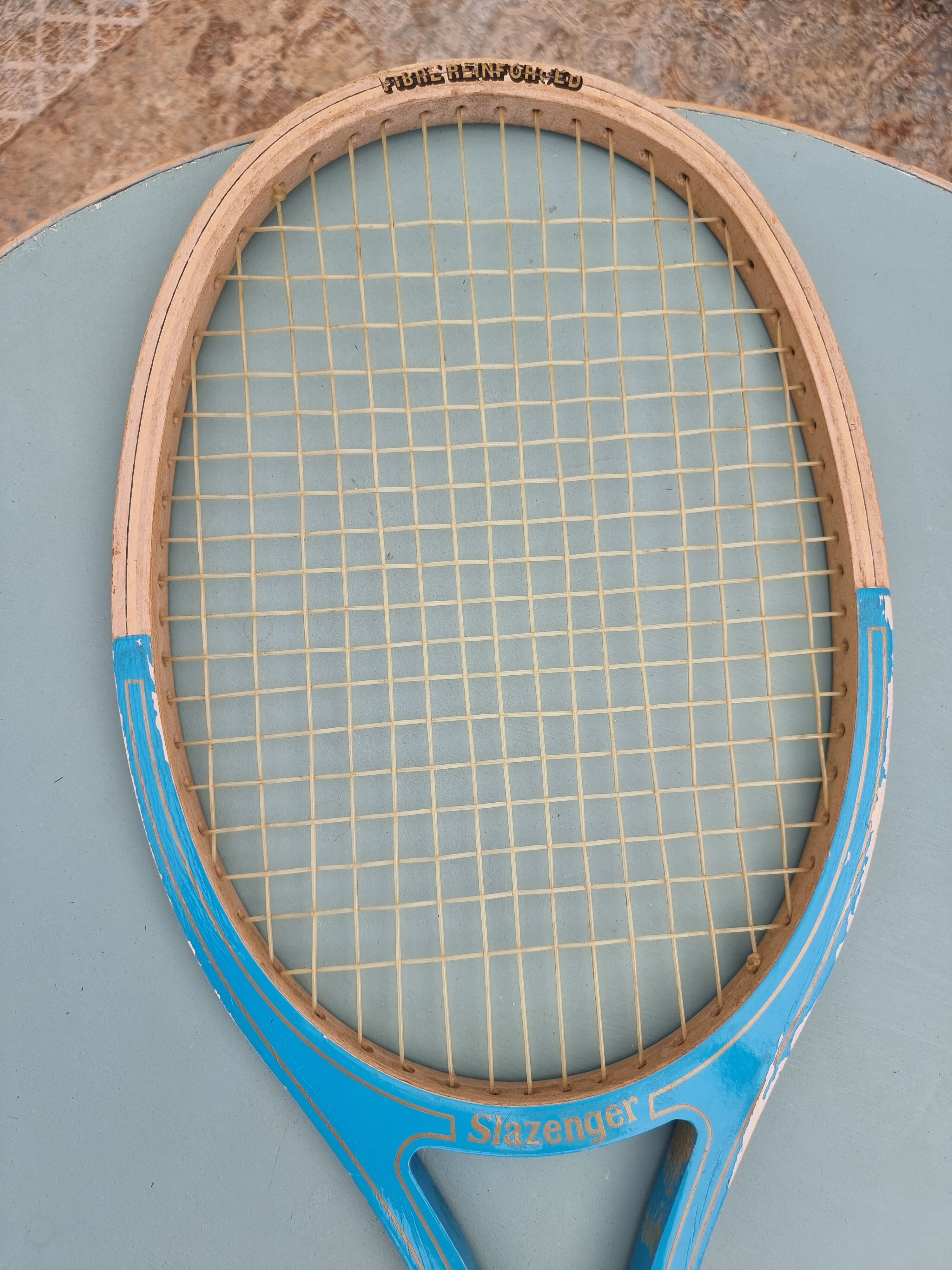 Vintage blue wooden racket