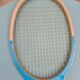 Vintage blue wooden racket