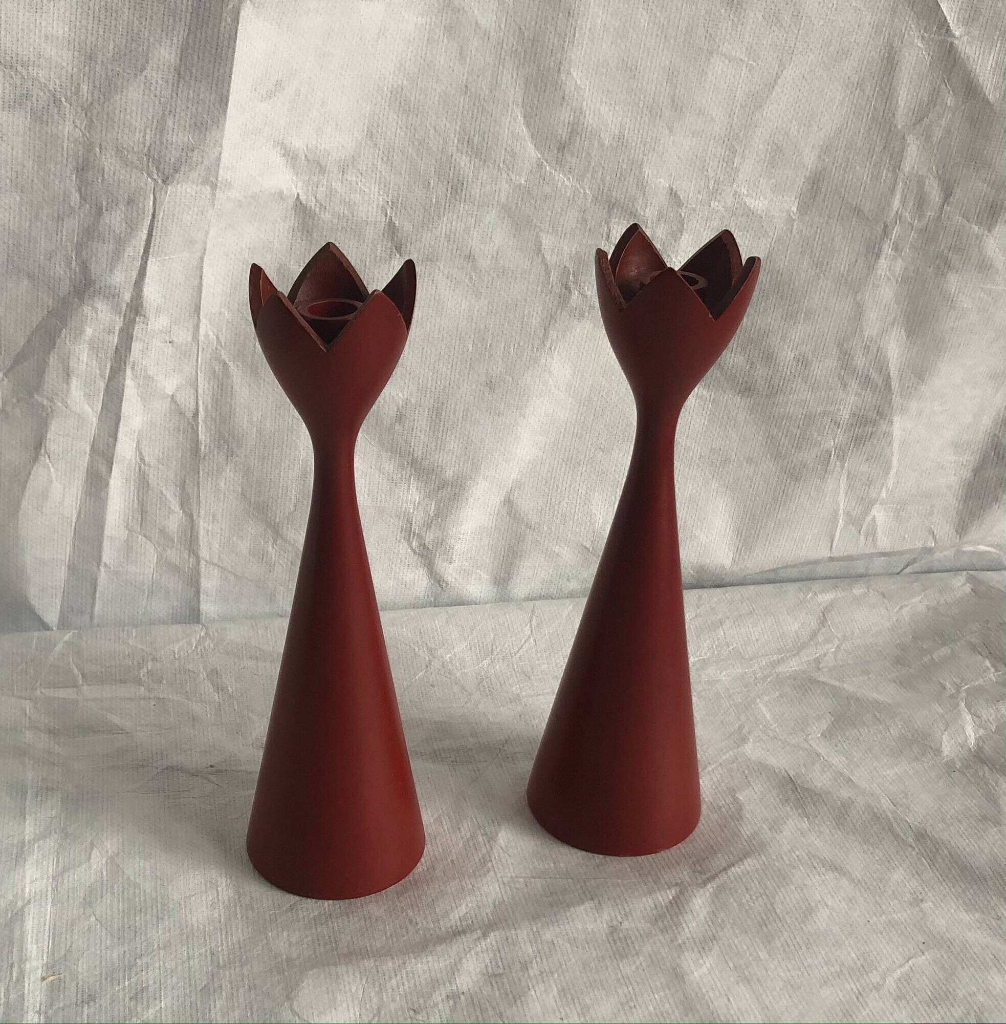 pair of Scandinavian painted wooden candle holders, minimalist atmosphere, free form