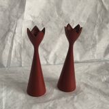 pair of Scandinavian painted wooden candle holders, minimalist atmosphere, free form