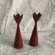 pair of Scandinavian painted wooden candle holders, minimalist atmosphere, free form