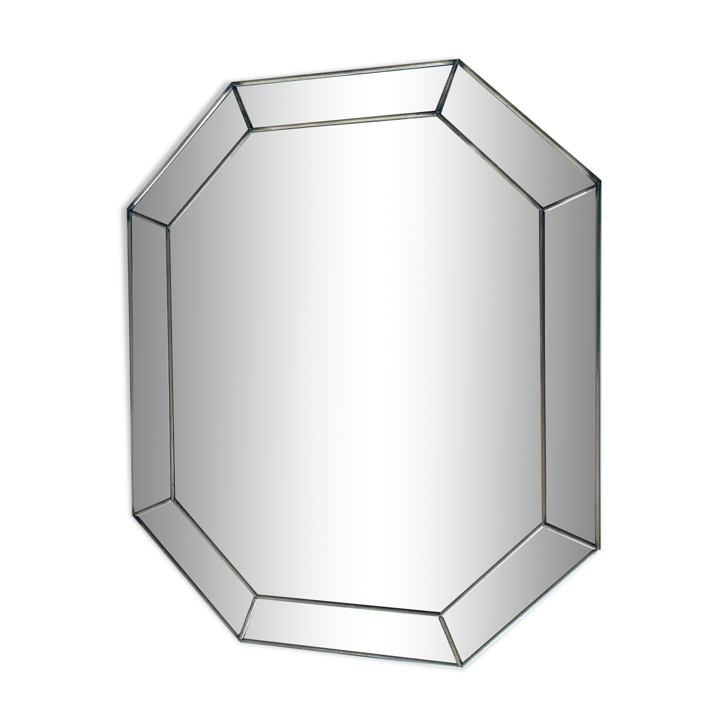 Old octagonal beveled mirror with parcloses